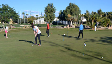 Harpury College Golf Academy students working on there putting technique at the Desert Springs Short Game Academy